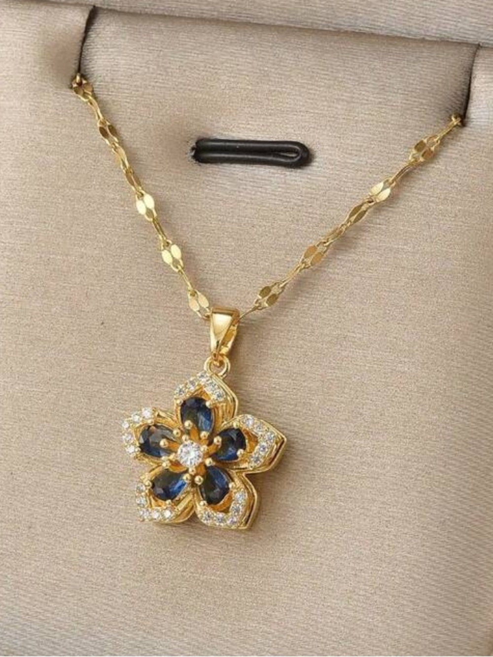 Gold Floral Pendant Necklace with Royal Blue Stones